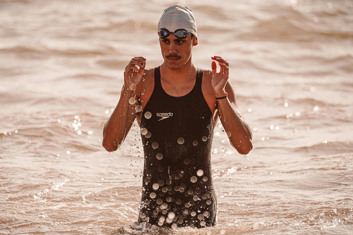 Swimmer in Swimsuit and Swim Cap | Photo by RUN 4 FFWPU